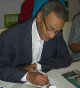 Bahaa Taher signing copies at the Emirates Airline Literature Festival