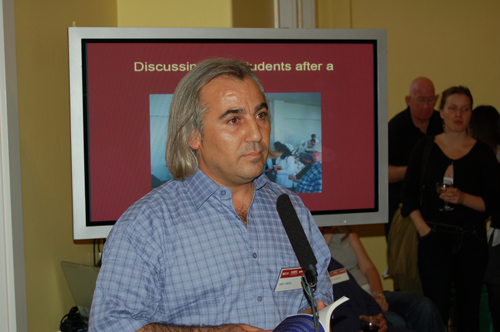 Abed Ismael reading some of his poems at the reception party